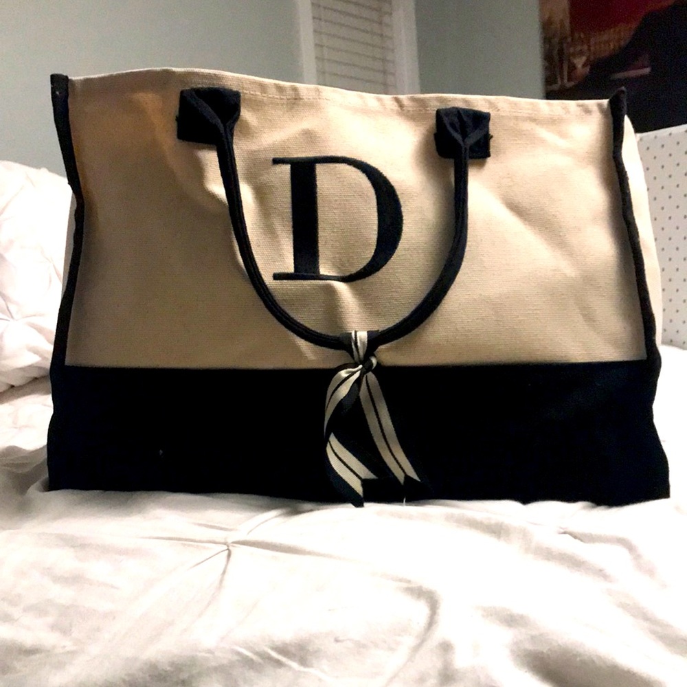 Cream and black weekender bag, Initialed with D